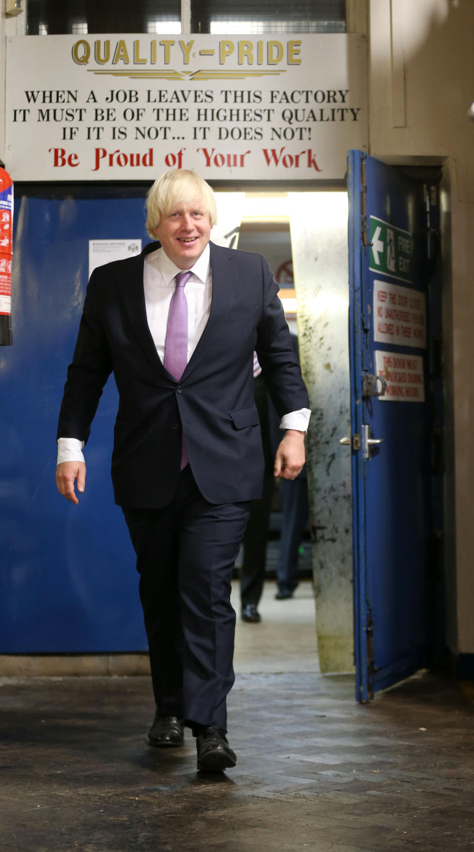 Mayor of London Boris Johnson visits McKenna Bothers makers of destination boards in Middleton during the second day of the Conservative Party Conference in Manchester.