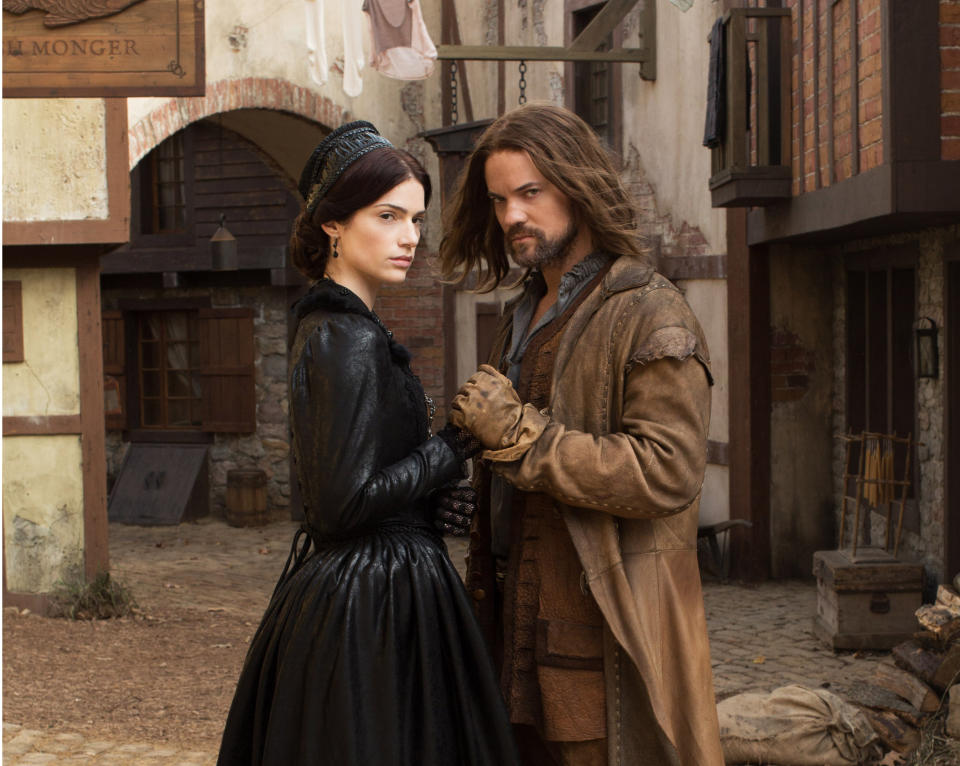 This photo provided by WGN America shows Janet Montgomery as Mary Sibley and Shane West as John Alden, in WGN America's ''Salem,'' premiering Sunday, April 20, 2014, (10pm ET, 9pm CT). Cable channel WGN America is adding original scripted programming to its schedule with the debut of the drama. (AP Photo/WGN America)