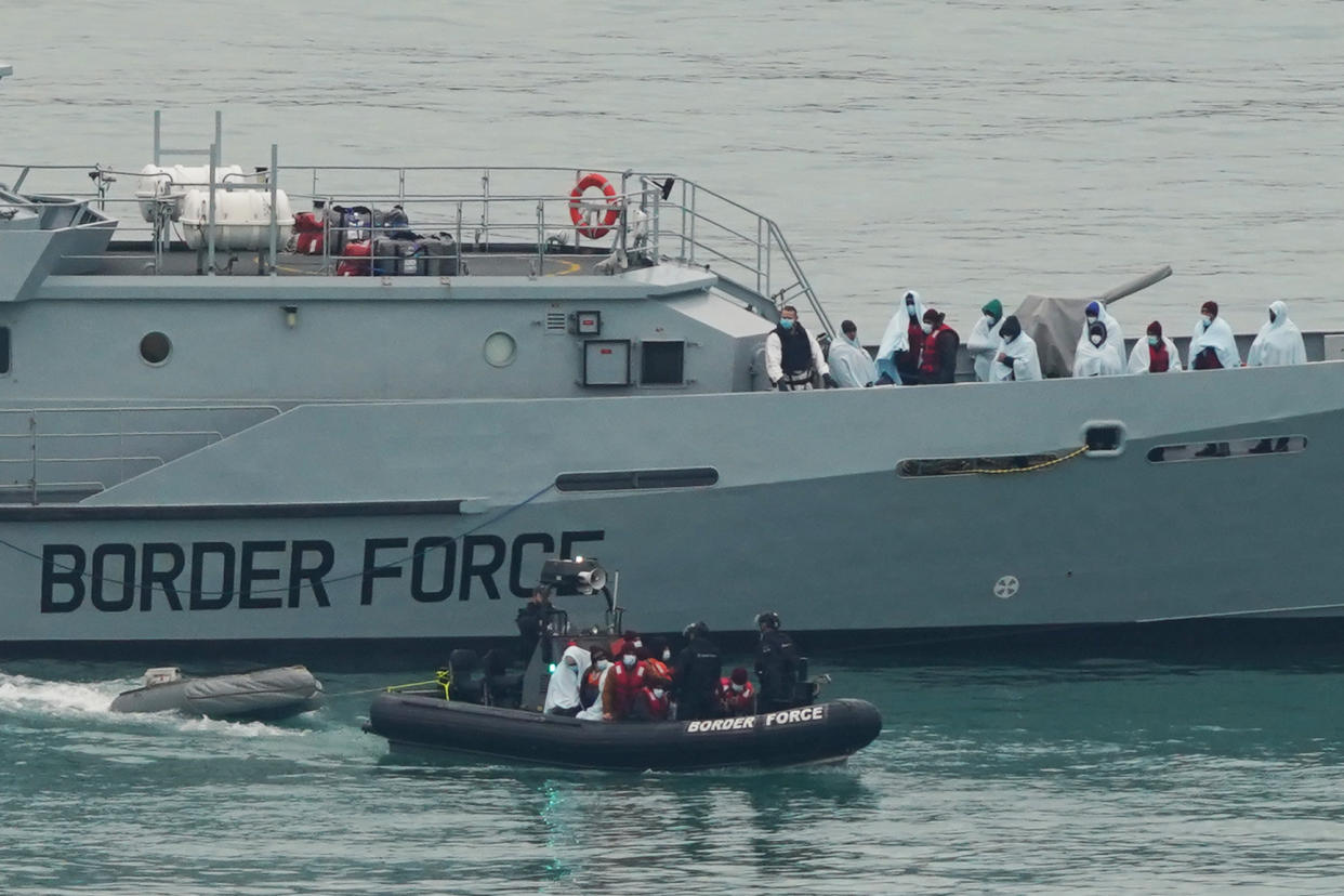 File photo dated 16/12/21 of a group of people thought to be migrants are brought in to Dover, Kent, by Border Force officers. Border Force officials could go on strike over Priti Patel's 