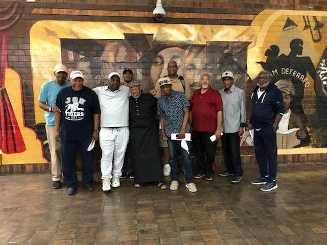 Men from the group Voices of the Elders mentor youth at the Camp Rise summer program. This year's program runs June 20 to July 31 at North Division High School.