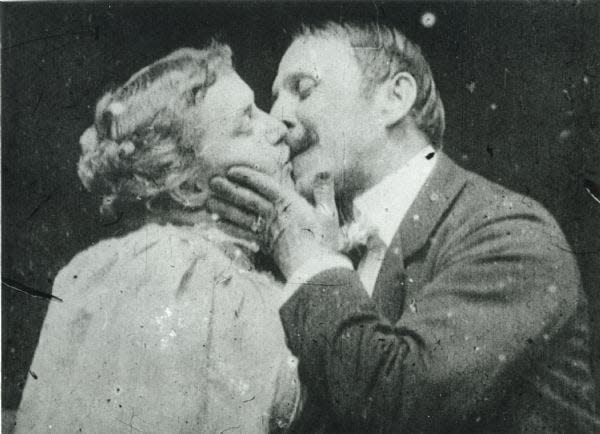 May Irwin smooches John C. Rice in the 1896 Thomas Edison silent film “The Kiss.”