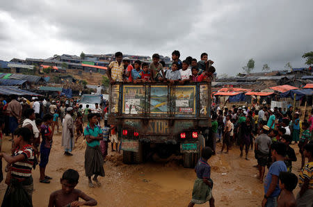 Rohingya refugee children gather on a truck in Cox's Bazar, Bangladesh, September 28, 2017. REUTERS/Cathal McNaughton