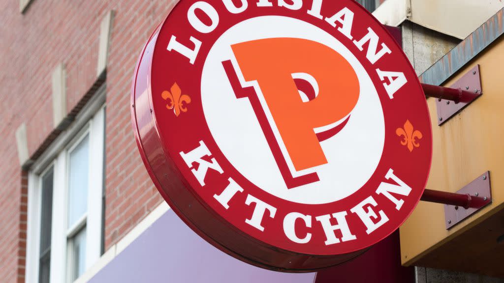 popeyes lousiana kitchen sing or logo outside a restaurant