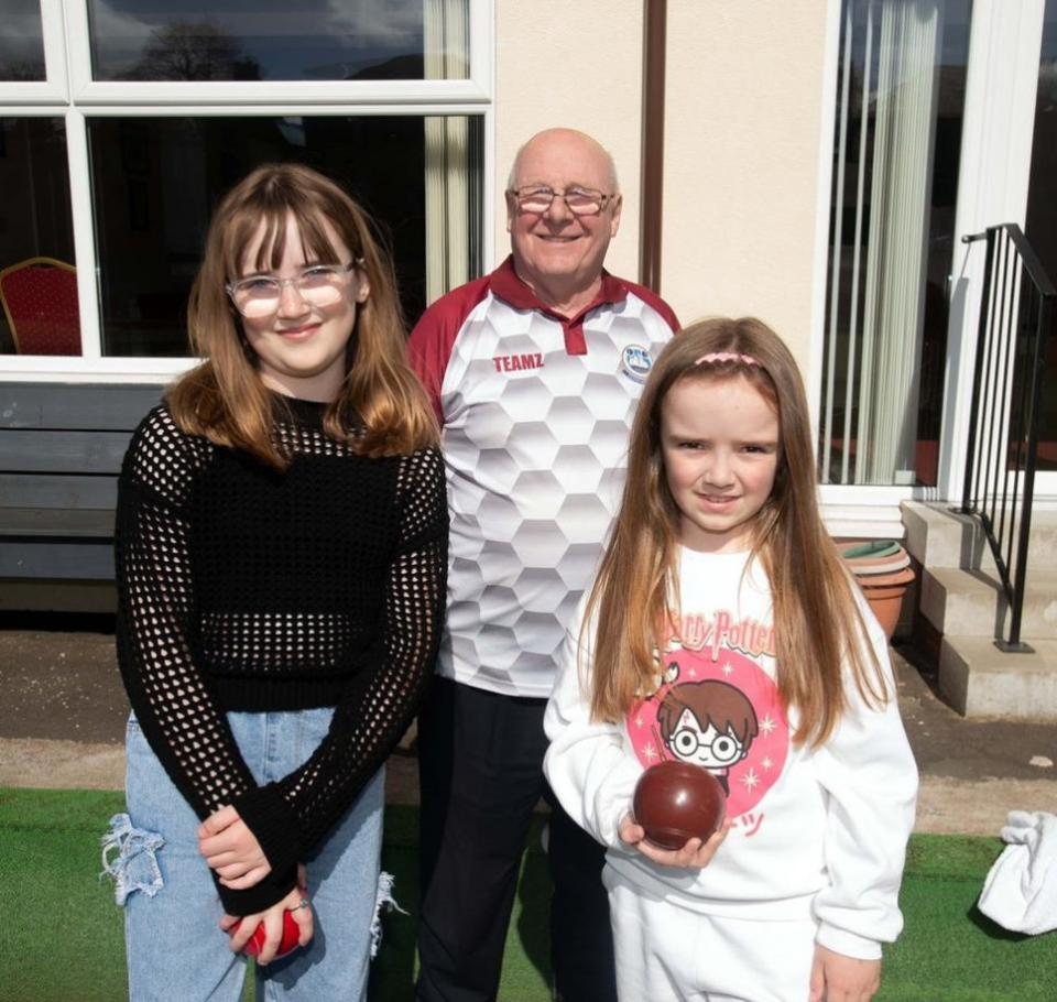 Greenock Telegraph: Youngsters try bowling at Lady Alice Bowling Club