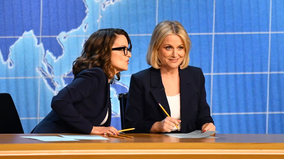 Tina Fey and Amy Poehler on Monday in a "Weekend Update" segment. - Valerie Macon/AFP/Getty Images