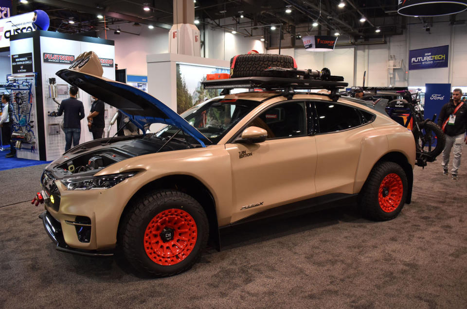 <p>Ford has a scaled-back presence at SEMA this year. One highlight is this Safari Concept, the work of Tjin Edition of Laguna Niguel, California. It’s billed as, “the ultimate off-road-ready electric vehicle” and features fender flares, Rigid lights, a Warn winch, lifted suspension and two elements from the upcoming Mach-E Rally production car – the front underbody shield and rear spoiler.</p>