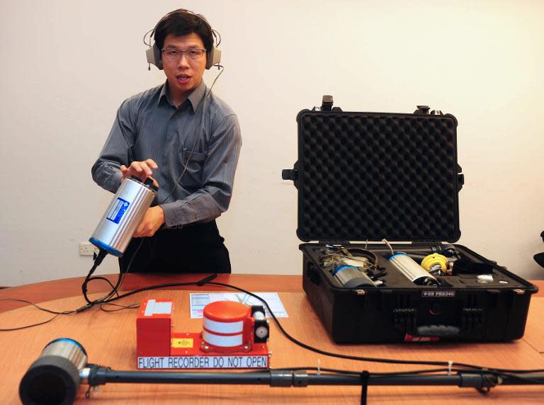 Singapore's Air Accident Investigation Bureau displays devices ready to be deployed in the search for QZ8501, at Changi Airport. Indonesia has accepted Singapore’s offer of specialists and two sets of underwater locator beacon detectors