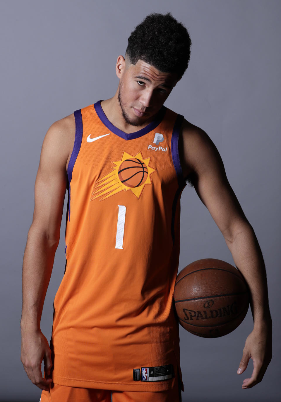 "Smile if you like being on the Phoenix Suns." — the photographer to Devin Booker, I presume