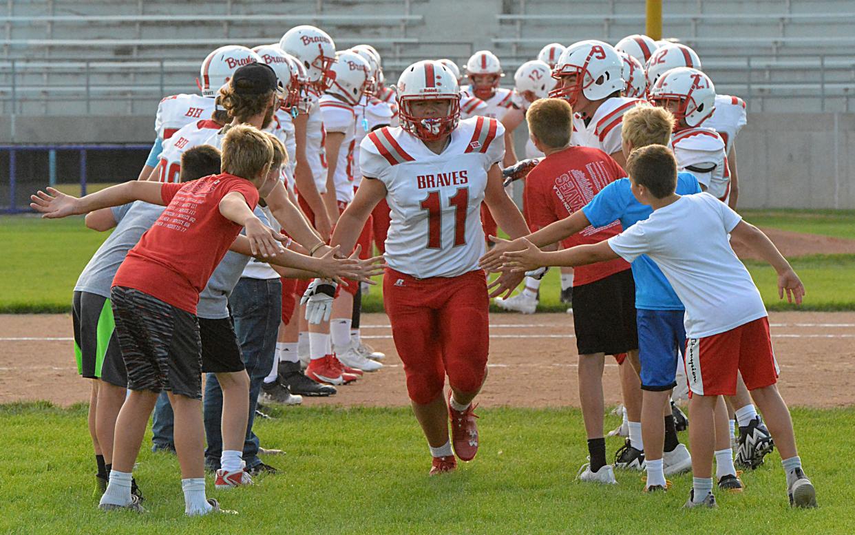 Britton-Hecla's Graham Fosness is introduced as a starter prior to their season-opening high school football game against Great Plains Lutheran on Friday, Aug. 18, 2023 at Watertown Stadium.