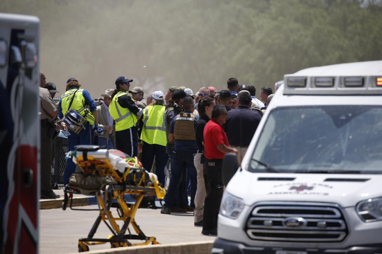 First responders gather outside Robb Elementary School in Uvalde, Texas, following a mass shooting on Tuesday. (AP Photo/Dario Lopez-Mills)