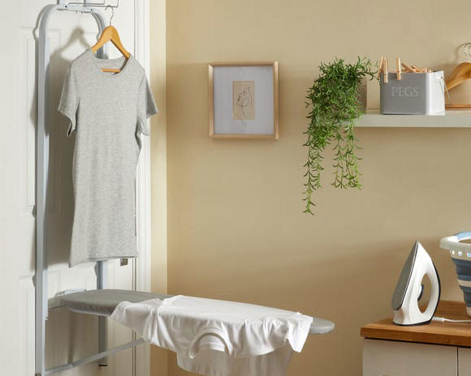 3. Try a space-saving pull out ironing board