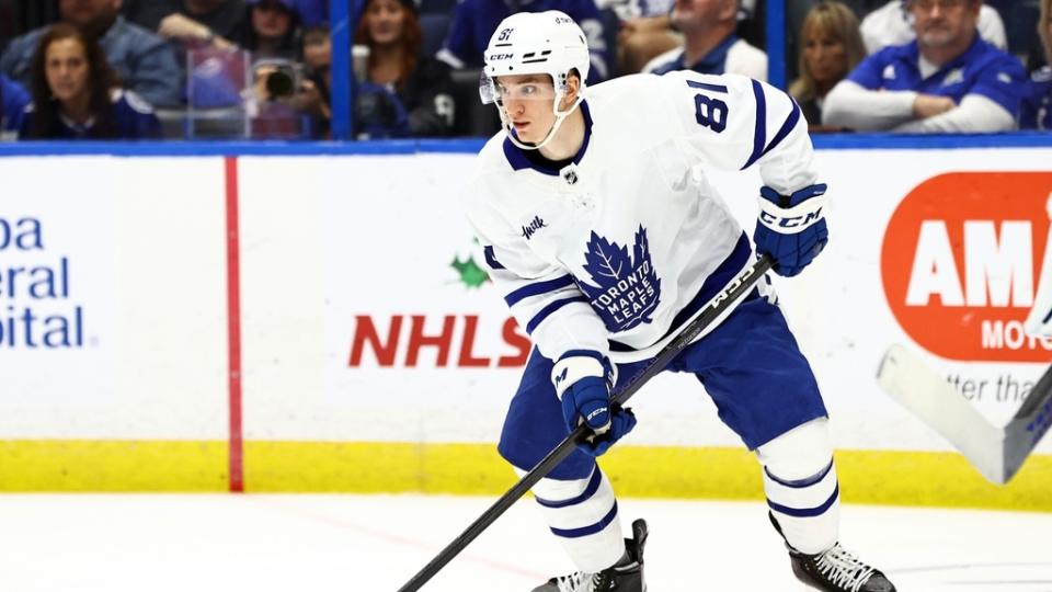 Dec 3, 2022; Tampa, Florida, USA; Toronto Maple Leafs defenseman Mac Hollowell (81) skates with the puck against the Tampa Bay Lightning during the third period at Amalie Arena.