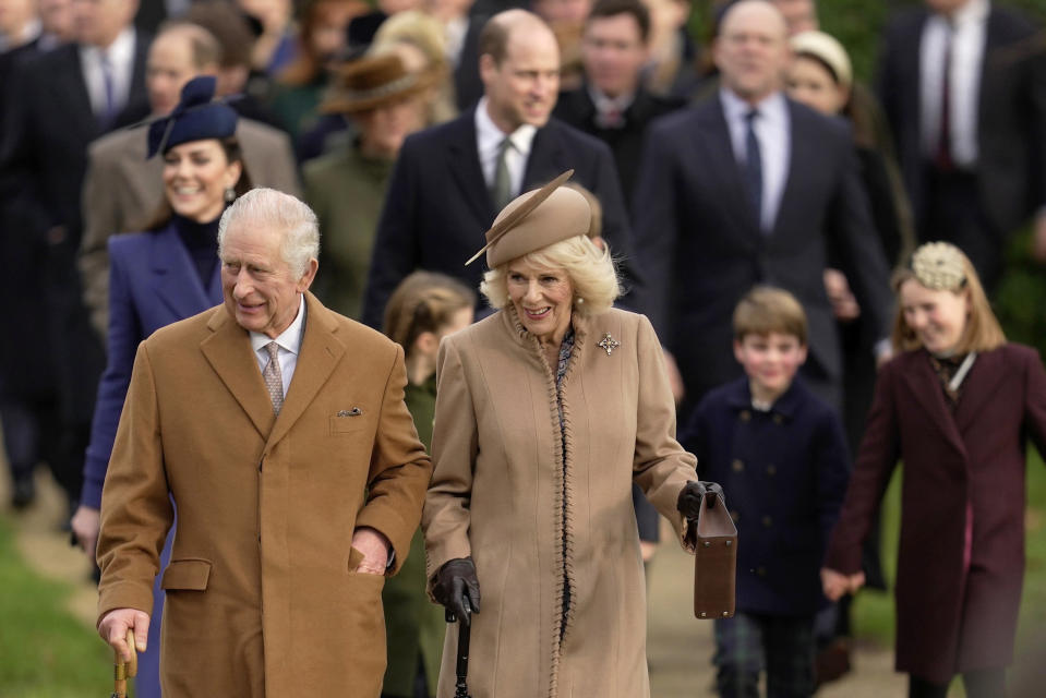 FILE - Britain's King Charles III and Queen Camilla arrive to attend the Christmas day service at St Mary Magdalene Church in Sandringham in Norfolk, England, Dec. 25, 2023. King Charles III is on the comeback trail. The 75-year-old British monarch will slowly ease back into public life after a three-month break to focus on his treatment and recuperation after he was diagnosed with an undisclosed type of cancer. (AP Photo/Kin Cheung, File)