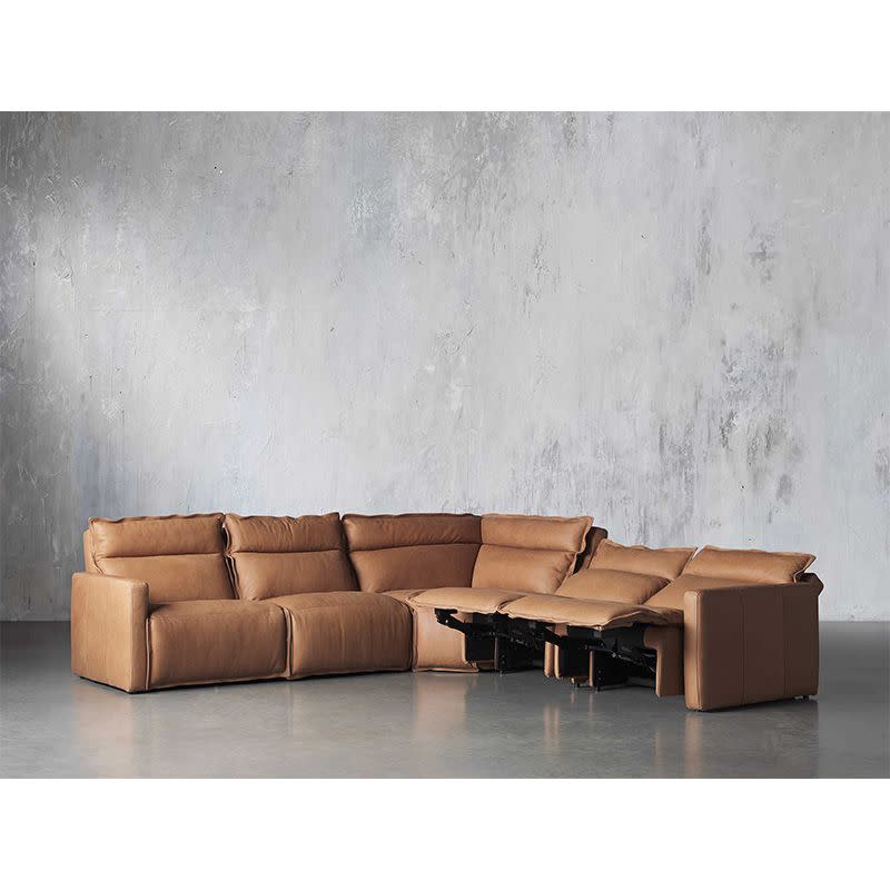 <p><a href="https://go.redirectingat.com?id=74968X1596630&url=https%3A%2F%2Fwww.arhaus.com%2Fproducts%2Frowland-leather-five-piece-motion-sectional%3Fvariant%3D43141464588459&sref=https%3A%2F%2Fwww.esquire.com%2Flifestyle%2Fg43026873%2Fbest-sectional-sofas%2F" rel="nofollow noopener" target="_blank" data-ylk="slk:Shop Now;elm:context_link;itc:0;sec:content-canvas" class="link ">Shop Now</a></p><p>Rowland Motion Sectional</p><p>arhaus.com</p><p>$12899.00</p>