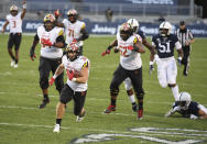 FILE - In this Nov. 7, 2020, file photo, Maryland running back Jake Funk (34) scores a touchdown during the second quarter of an NCAA college football game against Penn State in State College, Pa. Maryland, coming off a milestone win over Penn State, faces Indiana on Saturday. (AP Photo/Barry Reeger, File)