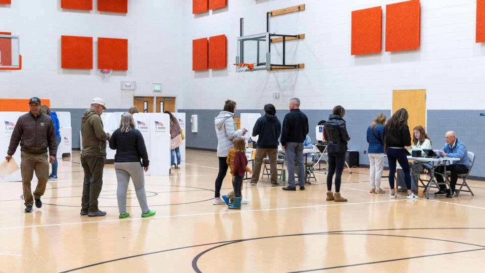 East Boise residents cast their ballots Tuesday. Flooding at the Idaho Department of Parks and Recreation forced two precincts to share the same venue this year.