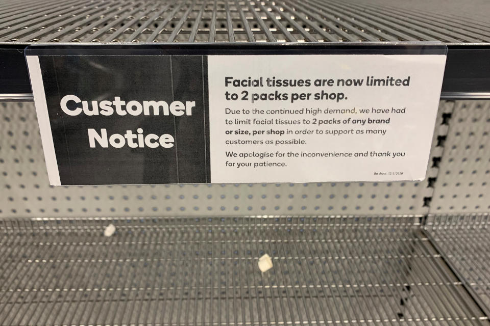 Empty shelves of tissues are seen at Woolworths Town Hall in Sydney. Source: AAP