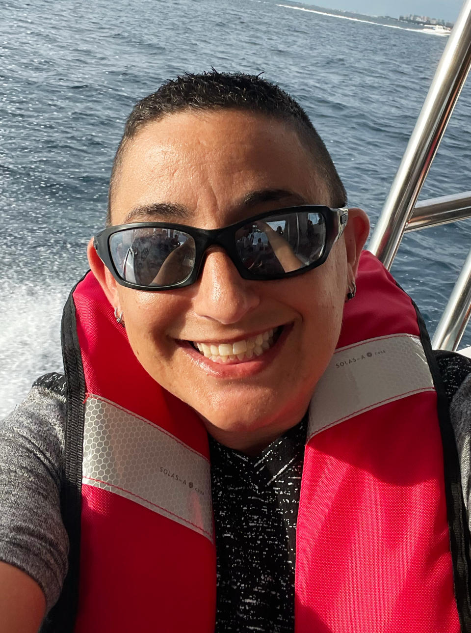 Selfie of Sharna Horn, on a boat, in a life vest. (Sharna Horn)