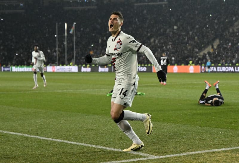 Leverkusen's Patrik Schick celebrates scoring his side's second goal during the UEFA Europa League round of 16 first leg soccer match between FK Karabakh Agdam and Bayer Leverkusen at Tofiq Bahramov Stadium. Federico Gambarini/dpa