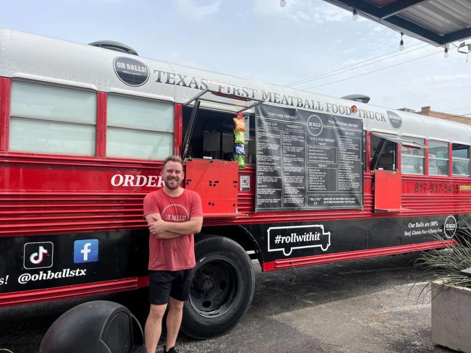 Kent Scroggins stands in front of his food truck, Oh Balls!, which is parked at 218 Bryan Ave. in Fort Worth’s South Main district.