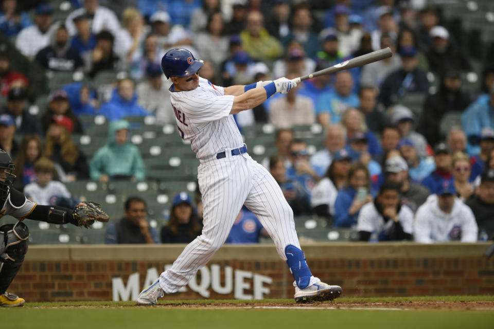 Chicago Cubs' Frank Schwindel watches his RBI single during the first inning of a baseball game against the Pittsburgh Pirates, Sunday, April 24, 2022, in Chicago. (AP Photo/Paul Beaty)