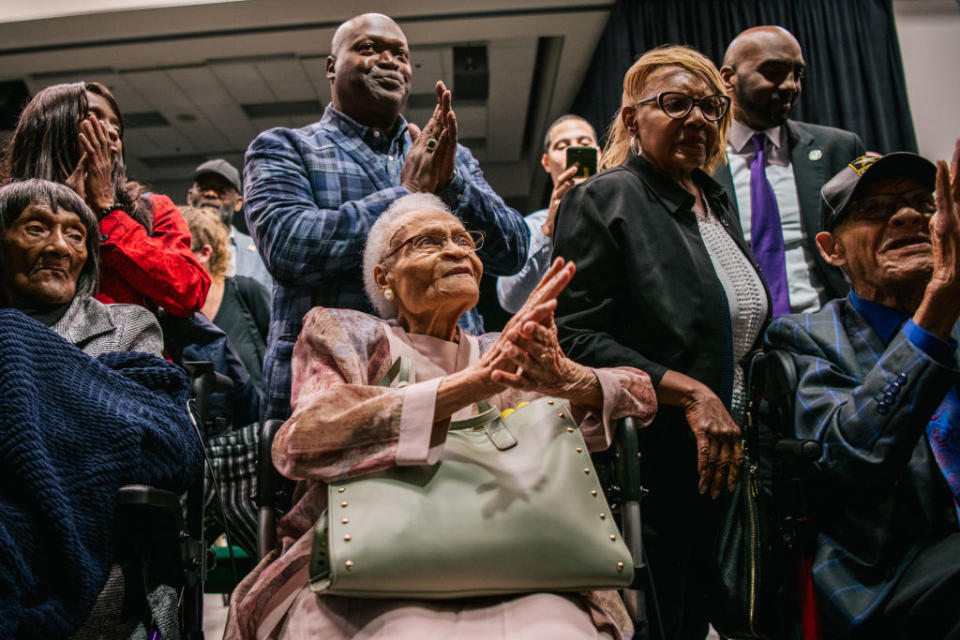 Survivors (front, left to right) Lessie Benningfield Randle, Viola Fletcher, and Hughes Van Ellis at the commemoration of the 100th anniversary of the Tulsa Race Massacre. In 1921, a white mob killed hundreds of residents in the city’s majority-Black Greenwood district, destroying banks, doctors’ offices, barbershops and over 1,250 residences — erasing years of Black success. Advocates name this tragic incident among the many reasons frank discussions on race are important in Oklahoma classrooms. (Brandon Bell/Getty Images)