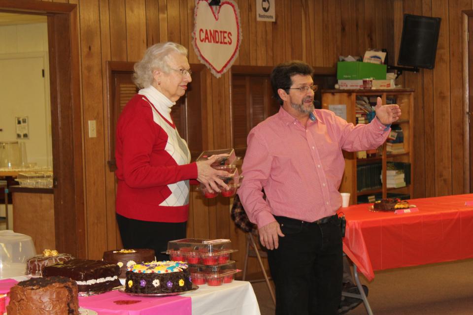 Jesse Maust of Springs will once again be back as the auctioneer for 2023 Death By Chocolate at 5:30 p.m. Friday. He is pictured here in 2020 with Britta Mitchell at the auction. Jesse always volunteers his time for this fundraiser.