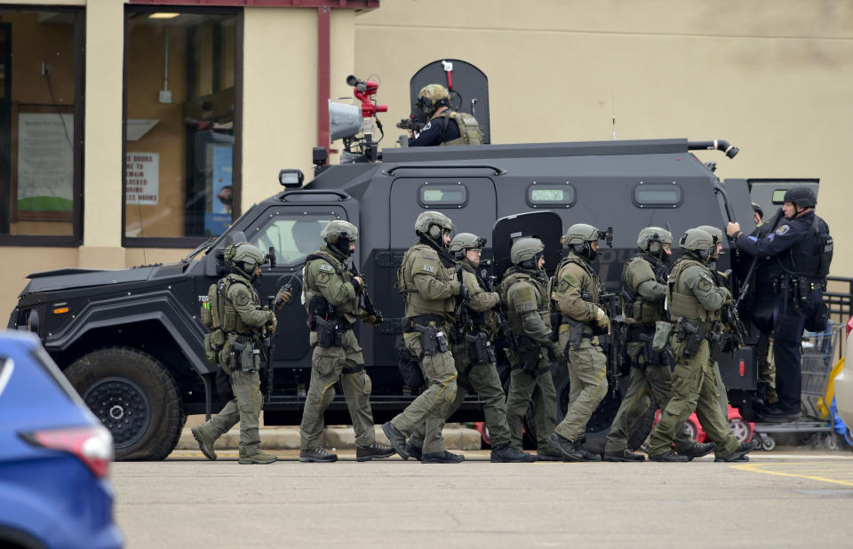 Police use an armored vehicle as a shield to move from one side of the building to the other at King Soopers in Boulder on Monday. (Photo: MediaNews Group/Boulder Daily Camera via Getty Images via Getty Images)