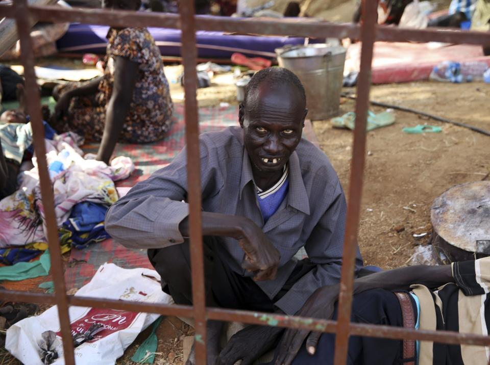 An internally displaced man sits inside a UNMIS compound in Juba