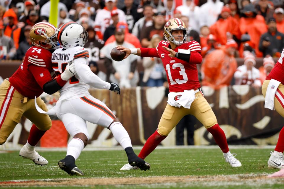 San Francisco 49ers quarterback Brock Purdy (13) throws the ball during an NFL football game against the Cleveland Browns, Sunday, Oct. 15, 2023, in Cleveland. (AP Photo/Kirk Irwin)