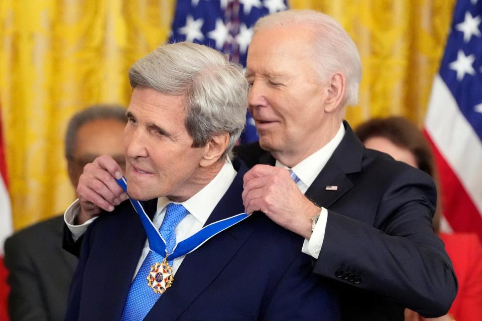 President Joe Biden awards the nation's highest civilian honor, the Presidential Medal of Freedom, to former Secretary of State John Kerry during a ceremony in the East Room of the White House, Friday, May 3, 2024, in Washington. (AP Photo/Alex Brandon) (AP)