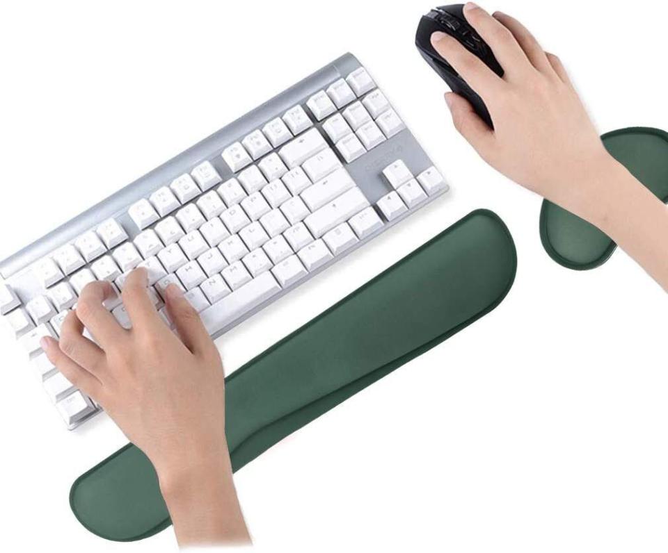 <div><p>"Your wrists should have room to rest on a desk and not float in the air," Kase said. "Your forearms should be parallel to the ground with wrists in a straight line."This memory foam keyboard and mouse wrist pad set comes in seven colors and will keep your arm supported. </p><p><i>You can buy the <a href="https://www.amazon.com/Poualss-Memory-Foam-Set-Christmas/dp/B08KXWHKR4" rel="nofollow noopener" target="_blank" data-ylk="slk:keyboard and mouse wrist pad rest;elm:context_link;itc:0;sec:content-canvas" class="link ">keyboard and mouse wrist pad rest</a> from Amazon for around $11-$13. </i></p></div><span> Amazon</span>