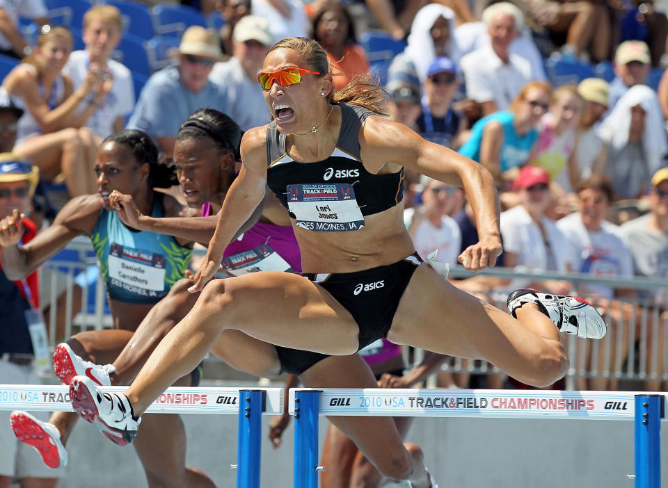 DES MOINES, IA - JUNE 26: Lolo Jones clears a hurdle on the way to victory in the Womens 100 Meter Hurdles during the 2010 USA Outdoor Track & Field Championships at Drake Stadium on June 26, 2010 in Des Moines, Iowa. (Photo by Andy Lyons/Getty Images)