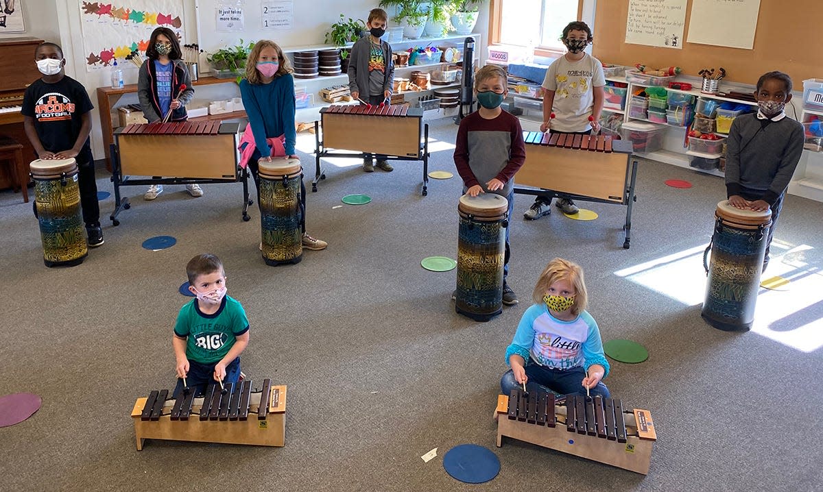 Lincoln students play on new instruments provided by the Macomb Education Foundation and the Parent Teacher Organization. Back rows, left to right: Daris Gosa, Andi Kovacs, Avery Schulz, Ben Merritt, James Crosby, Sam MacGruder and June Ogbonnaya. Front row, left to right: Leo Wright and Cassady Garlick