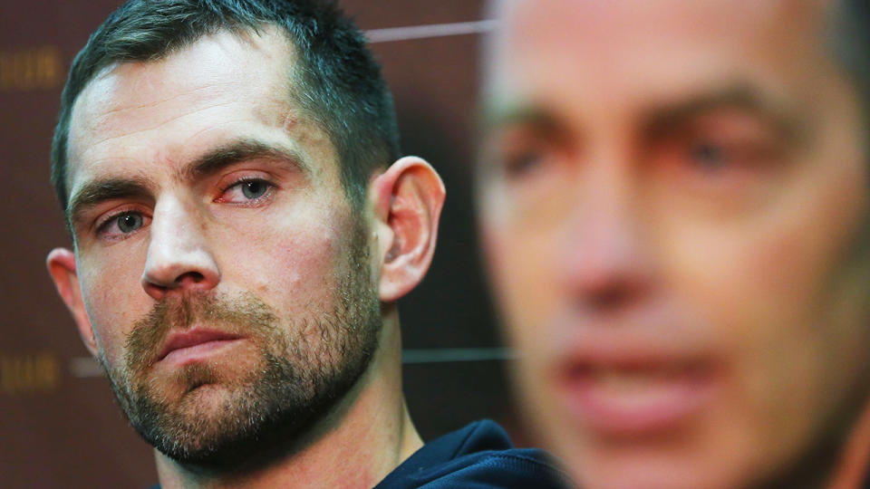 Former Hawthorn skipper Luke Hodge is pictured with Alastair Clarkson in the foreground.