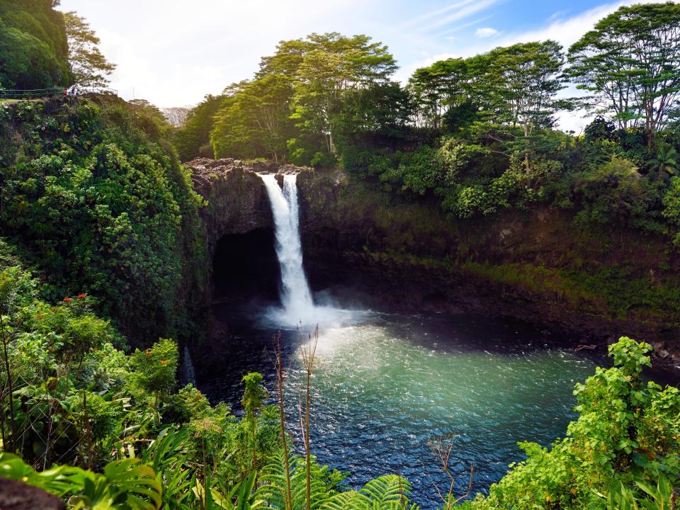 Majesitc Rainbow Falls waterfall in Hilo, Wailuku River State Park, Hawaii.