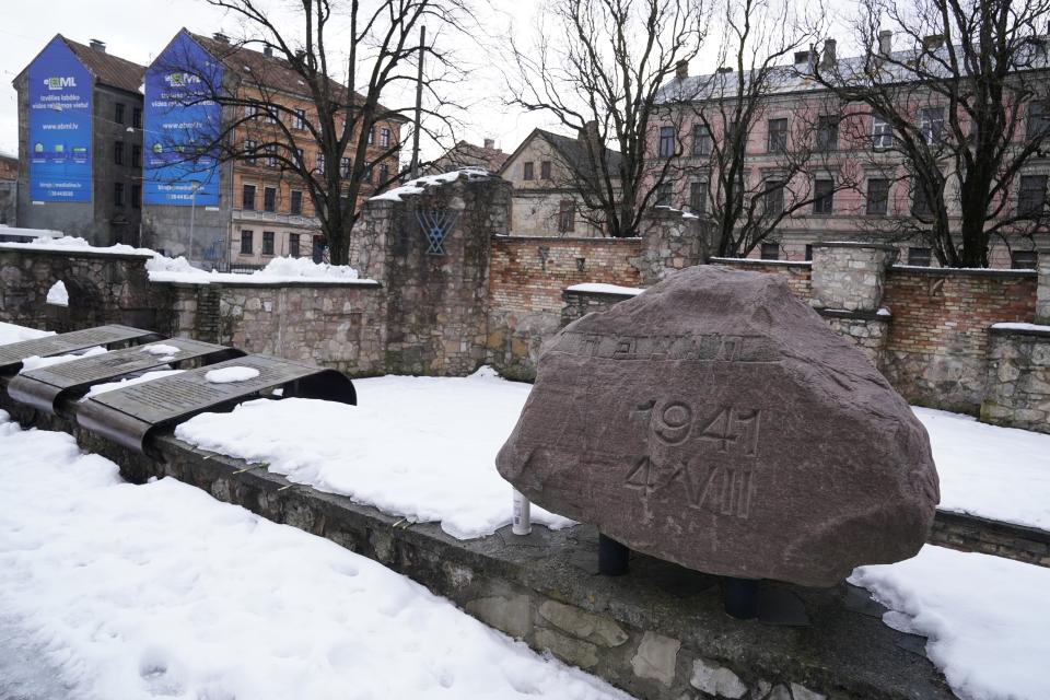 The memorial on the ruins of the Riga Choral Synagogue burned to the ground by Nazis in 1941, in memory of those who perished in the blaze, in Riga, Latvia, Thursday, Feb. 10, 2022. Latvia’s Parliament has passed a milestone Holocaust restitution bill after years of wrangling in a move that will provide compensation for lost prewar Jewish property and funding to revitalize the Baltic nation’s Jewish community that perished almost completely during World War II. (AP Photo/Roman Koksarov)