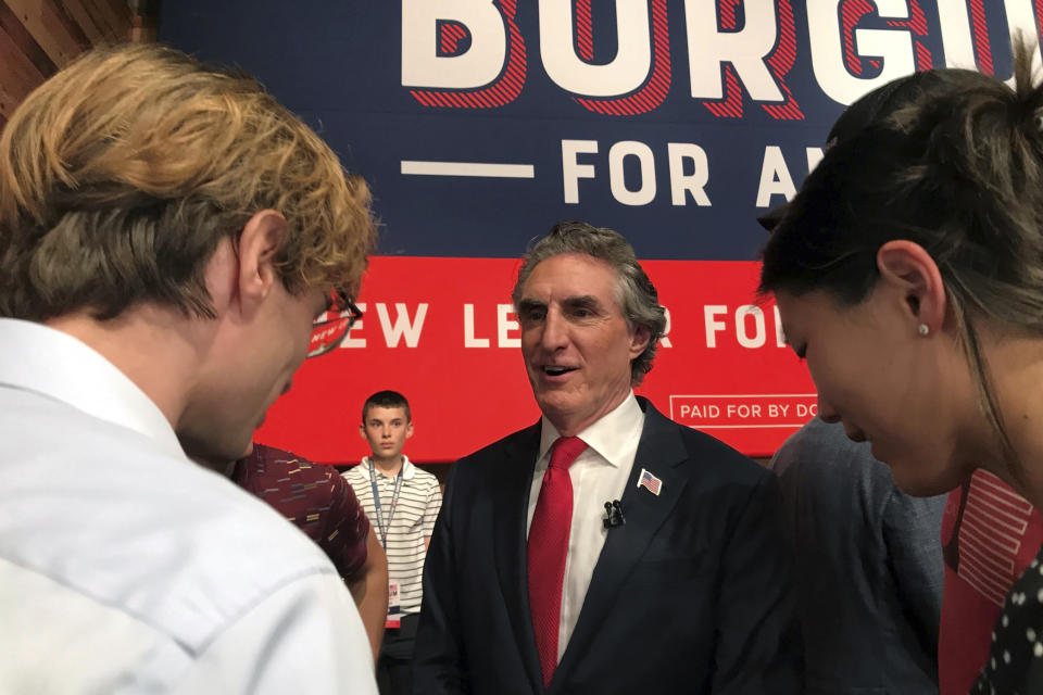 North Dakota Gov. Doug Burgum talks with supporters after he announced his bid for the Republican nomination for President, Wednesday, June 7, 2023, in Fargo, N.D. (AP Photo/Jack Dura)