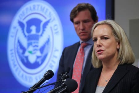 U.S. Secretary of Homeland Security Kirstjen Nielsen and Under Secretary Chris Krebs speak to reporters at the DHS Election Operations Center and National Cybersecurity and Communications Integration Center (NCCIC) in Arlington, Virginia, U.S. November 6, 2018. REUTERS/Jonathan Ernst