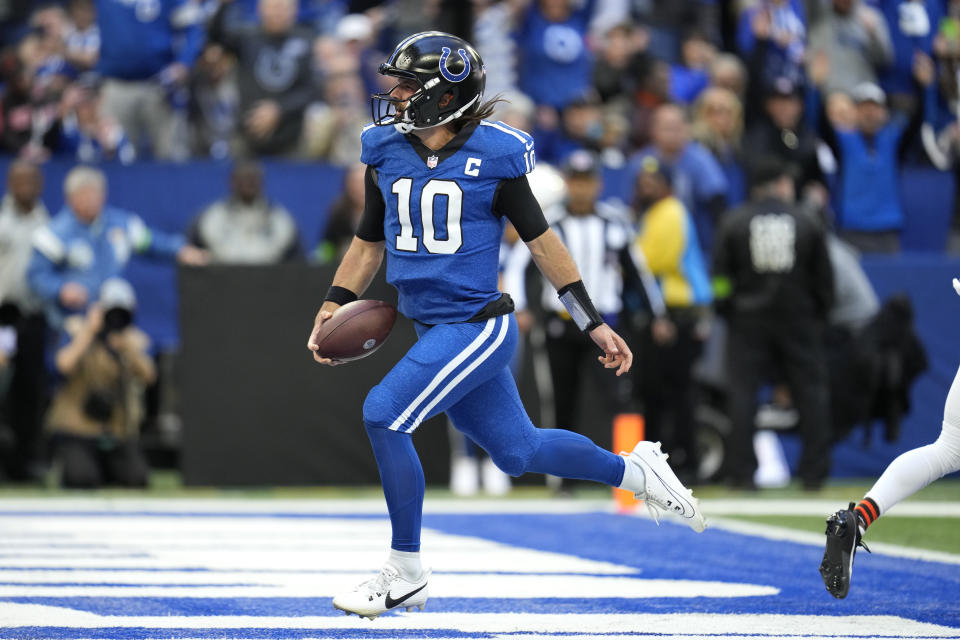 Indianapolis Colts quarterback Gardner Minshew (10) celebrates after scoring on a 17-yard touchdown run during the first half of an NFL football game against the Cleveland Browns, Sunday, Oct. 22, 2023, in Indianapolis. (AP Photo/Michael Conroy)