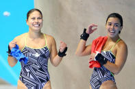 LONDON, ENGLAND - JULY 31: Roseline Filion and Meaghan Benfeito of Canada celebrate after winning the bronze in the Women's Synchronised 10m Platform Diving on Day 4 of the London 2012 Olympic Games at the Aquatics Centre on July 31, 2012 in London, England. (Photo by Al Bello/Getty Images)