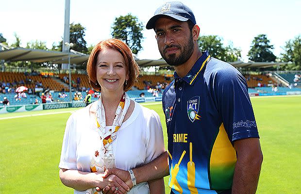 Julia Gillard with Fawad Ahmed at the Prime Minister's XI match in January. SOURCE: Getty Images