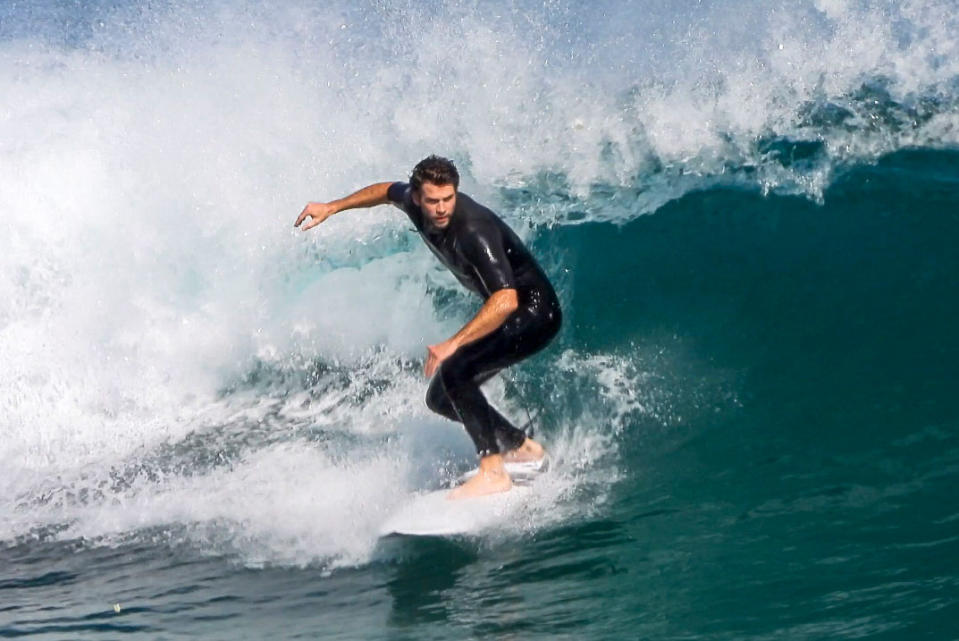 <p>Liam Hemsworth shows off his surfing skills on Sunday on Phillip Island in Australia.</p>