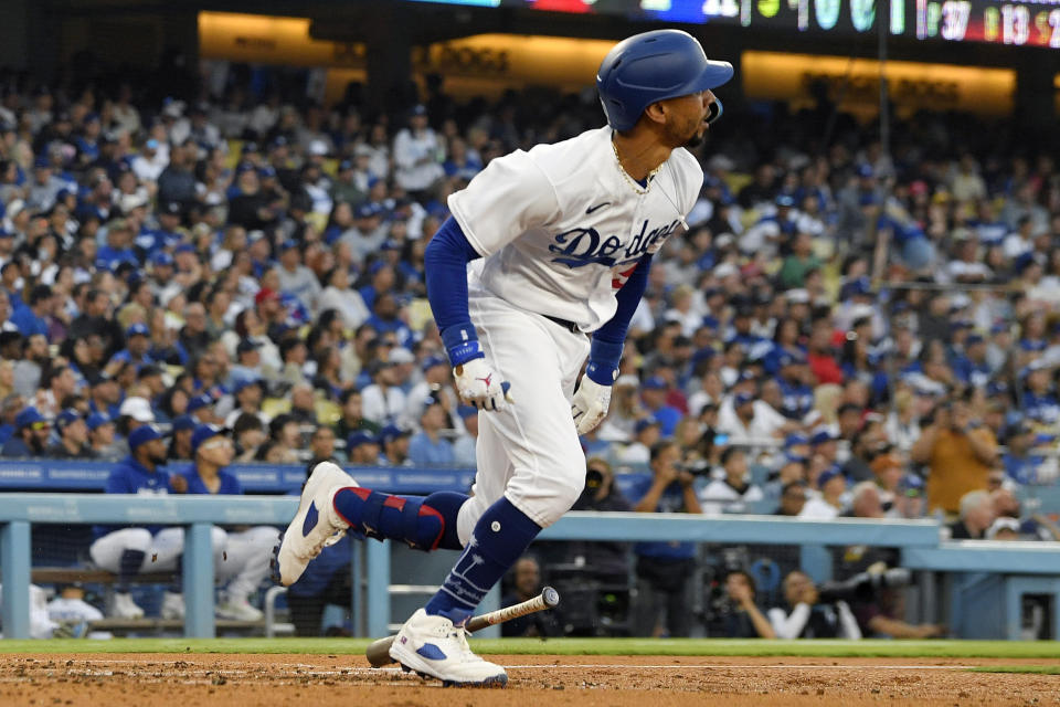Los Angeles Dodgers' Mookie Betts drops his bat after hitting a solo home run during the third inning of a baseball game against the Los Angeles Angels Friday, July 7, 2023, in Los Angeles. (AP Photo/Mark J. Terrill)