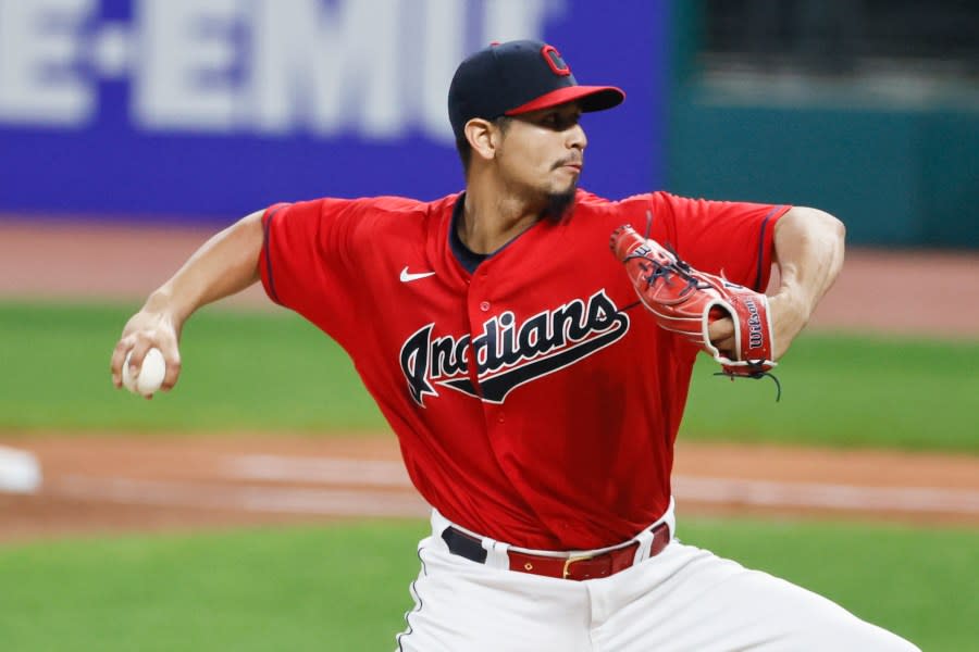 Cleveland Indians starting pitcher Carlos Carrasco delivers against the Pittsburgh Pirates during the second inning of a baseball game, Friday, Sept. 25, 2020, in Cleveland. (AP Photo/Ron Schwane)