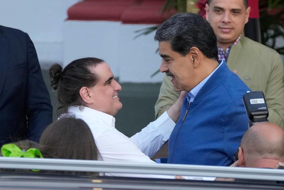 Venezuelan President Maduro, right, receives Alex Saab at Miraflores presidential palace in Caracas, Venezuela, Wednesday, Dec. 20, 2023. The United States freed Saab, who was arrested on a U.S. warrant for money laundering in 2020, in exchange for the release of 10 Americans imprisoned in Venezuela, U.S. officials said Wednesday. 