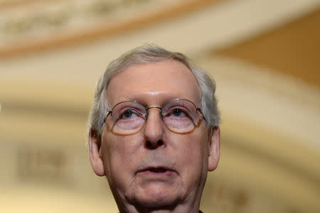 FILE PHOTO: Senate Majority Leader Mitch McConnell speaks with reporters about his reaction to President Donald Trump's proposed FY2020 budget in Washington, U.S. March 12, 2019. REUTERS/Erin Scott