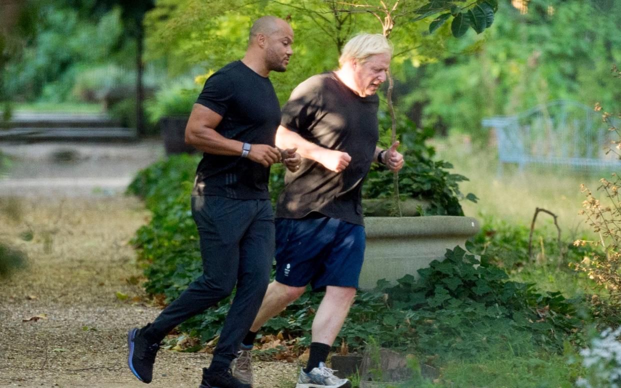 PT Harry Jameson and the PM work out near Westminster on Wednesday morning  - Jeremy Selwyn 