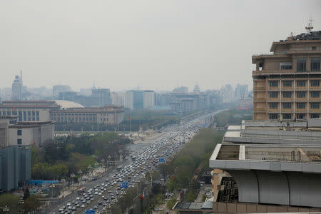 The Beijing Hotel (R) overlooks Chang'an Avenue and Tiananmen Square in Beijing, China April 9, 2019. Picture taken April 9, 2019. REUTERS/Thomas Peter