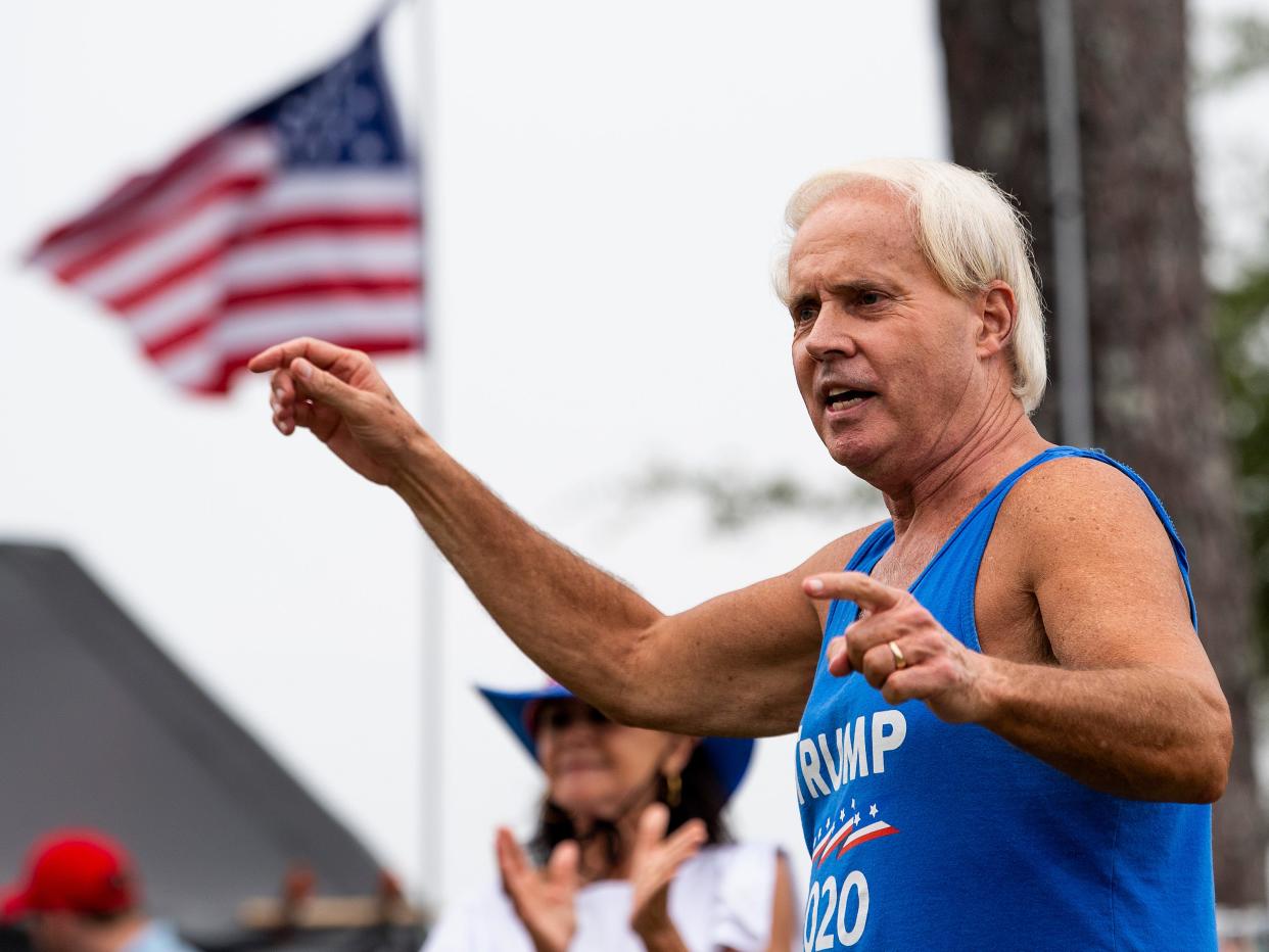 Perry Hooper, Jr., leads a small rally after the Donald Trump supporter boat parade at Lake Martin on Saturday September 19, 2020. 